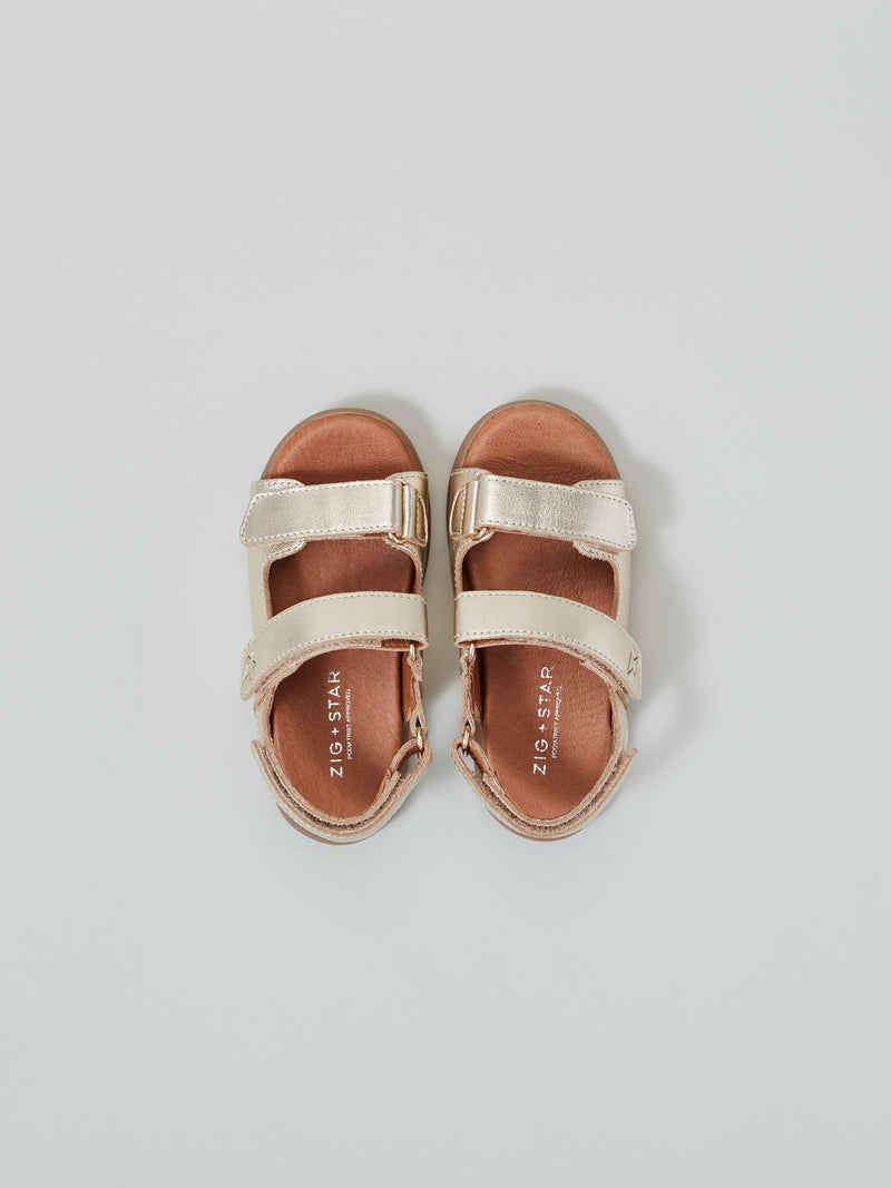 ZIG AND STAR SOLAR INFANT SANDAL GOLD DUST TOP